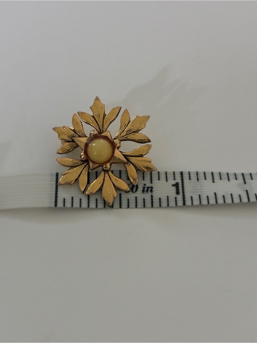 Gold Floral Sunburst Brooch with Cream Center